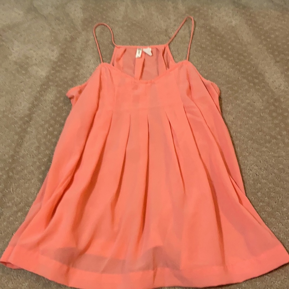 Coral tank, perfect to tuck in with white jeans
